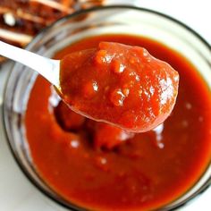 a spoon full of homemade cranberry orange sauce