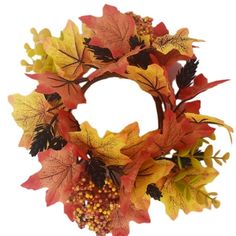 a wreath with leaves and berries on it