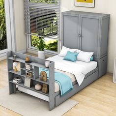 a bedroom with a bed, bookcase and window in it's center area