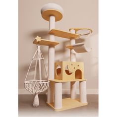 the cat tree is made out of wood and has several different types of scratching toys