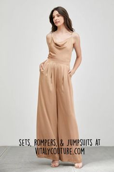 Shop Our Catalog of Women Sets, Rompers & Jumpsuits by Vitaly Couture | Women Outfits | A perfect blend of sophistication and texture that adds a touch of elegance to your wardrobe. This jumpsuit features a cowl neck design with intricate trim detailing, meticulously woven to create a unique and visually captivating ensemble. women fashion sets | skirt and tops | pants and tops | shorts and tops | rompers | rompers for women | denim rompers | chic rompers | classy rompers | jumpsuits for women | classy jumpsuits | date night outfits | date night rompers | date night jumpsuits | fashion for women | chic style | classy style | wpmens outfits Jumpsuits For Women Classy, Skirt And Tops, Classy Romper, Outfits Date, Classy Jumpsuit, Chic Romper, Rompers For Women, Women's Fashion Set, Jumpsuit Pattern