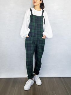 • Super comfortable and roomy overalls with adjustable straps. • Warm plaid flannel made of 100% cotton, to keep you warm in winter.  • Colors: black, green, and blue plaid. • Add or take off any pockets at no extra cost, just let me know in the comments. Options: front bib, 2 front square pockets, 2 back square pockets.• Lengthen or shorten up to 15cm / 6in at no extra cost, just let me know in the comments. | SIZES |Please check the measurements carefully. These overalls are a loose fit, but i Casual Overalls And Rompers For Fall, Casual Overalls Jumpsuits For Fall, Fall Cotton Overalls For Loungewear, Trendy Fall Overalls With Suspenders, Fall Bib Front Overalls With Suspenders, Suspenders Jumpsuits And Rompers For Workwear In Fall, Relaxed Fit Overalls For Fall, Green Relaxed Fit Overalls, Winter Cotton Jumpsuits And Rompers For Work