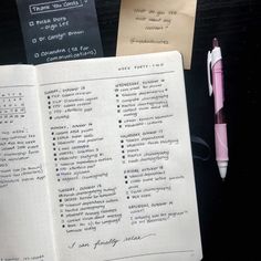 a notepad and pen sitting on top of a desk next to some papers with writing