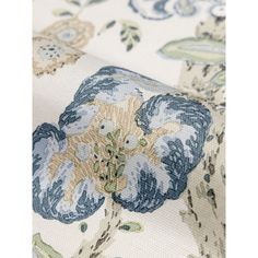 an image of a flower print fabric on a white background with blue and yellow flowers