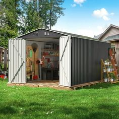 a small shed sitting on top of a lush green field