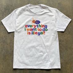 Everything I Want To Do Is Illegal T-Shirt Fast Shipping $25 Lowest I Can Do Custom Deadstock Hit Me With Questions Meme T Shirts Design, Chaotic Shirts, Bi Outfits, Clowncore Shirt, Kidcore Shirt, Bleach Jeans, Silly Shirts, Clown Shirt, Freetime Activities