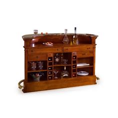 an old fashioned bar with wine glasses and bottles on the top shelf, against a white background