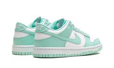 The Nike Dunk Low GS “Mint Foam” is the youth sizing of the retro basketball shoe in a colorway with a spring-ready appearance.  The “Mint Foam” features a white leather base and Mint Foam-colored leather overlays and Swoosh branding on its design.  Classic “Nike” detailing is embroidered on the heel, while “Nike” and Swoosh logos appear on the tongue tag.  Underfoot, the shoe’s white rubber midsole and Mint Foam rubber outsole complete the look. Cute Nike Dunks, Cute Jordans, Nike X Travis Scott, Foams Shoes, Foam Shoes, Outfit Pieces, Shoes For School, Classic Nike, Retro Basketball Shoes