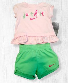 You are bidding on a Nike BABY GIRLS 2 PC SET     Sizes:   6 MONTHS  TOO CUTE!!! Short sleeve tee has snaps at back and cute ruffle Elastic waist mint green knit shorts  MSRP $30.00 GREAT DEAL!!!    This item is new with tags.  From a smoke-free home; combined shipping available.    Auction Terms & Methods of Payment   It is my desire to offer good, quality merchandise with full and accurate descriptions so that you may bid with confidence. All sales are final.  Please feel free to email me with Spring Cotton Sets In Short Style, Short Cotton Sets For Spring, Cotton Spring Sets In Short Style, Spring Playwear Shorts With Ruffles, Cute Cotton Sets With Relaxed Fit, Spring Ruffled Shorts For Playwear, Cute Relaxed Fit Cotton Sets, Pink Cotton Relaxed Fit Sets, Pink Cotton Sets With Relaxed Fit