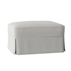 a white and grey striped ottoman