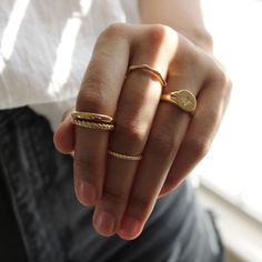 Super cute, minimal gold filled roped stacking ring. This ring features a delicate 1mm twisted band. It is water friendly but note- it is dainty and meant to pair with others for added durability. Available in whole sizes 5-9. Materials: 14k Gold Filled Band Width: 1mm Hypoallergenic. Nickel and lead free. What does Gold-Filled mean? Gold filled jewelry contains 1/20th (5%) of real gold content, or more than 100x real gold content that most gold plated jewelry. The process to make gold-filled je Stackable Gold Rings, Stackable Rings Gold, Gold Stackable Rings, Minimal Gold, Double Band Rings, Velvet Jewelry, Dope Jewelry, Twist Ring, Hand Jewelry