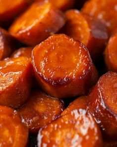 close up view of cooked carrots with ketchup