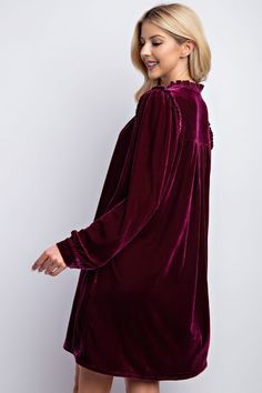 Introducing our Mini Ruffle Detailing Velvet Dress, a chic and versatile addition to your wardrobe that combines elegance with comfort.Key Features:1. Sizes: Available in Small (S), Medium (M), and Large (L) to suit a variety of body sizes.2. Design: This velvet dress features a V-neck, delicate ruffle detailing on the top, convenient side pockets, a loose and boxy fit, and a stylish high-low hem for a contemporary touch.3. Fabric: Crafted from a luxurious blend of 95% Polyester and 5% Spandex, Velvet Tunic Dress, Dirndl Outfit, Velvet Tunic, Bandeau Tops, 1920s Flapper Dress, Velour Dress, Plunge Dress, Short Playsuit, Elegant Color