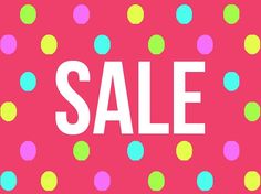 a pink banner with colorful polka dots and the word sale on it's side