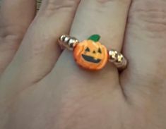 This ring is perfect for the Fall season! Or, it is great for the minimalist jewelry fans too! Made with rose gold lightweight beads and a  pumpkin clay charm. The ring will fit sizes 5-10 since it is made with a stretchy cord. If you need a different size, just let us know in the notes section of the order. Pumpkin Clay, Pumpkin Ring, Stretchy Rings, Fall Rings, Clay Charms, Season Autumn, Stackable Rings, Minimalist Jewelry, Fall Pumpkins