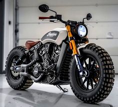 a motorcycle parked in front of a garage door