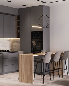 a modern kitchen with grey cabinets and bar stools