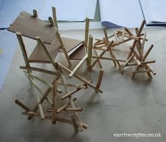 several pieces of wood sitting on top of a table