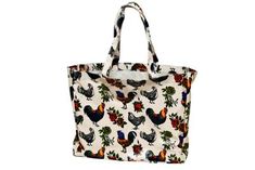 a white tote bag with chickens and roosters all over the print on it