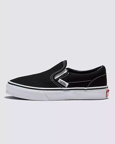 Vans | Kids Classic Slip-On Black/True White Shoes Black Slip-on Canvas Shoes For Streetwear, Vans Black Slip-on Sneakers With Rubber Sole, Black Vans Slip-on Sneakers With Rubber Sole, Black Vans Slip-on Sneakers For Streetwear, Sporty Black Vans Slip-on Sneakers, Vans Black Slip-on Sneakers With Round Toe, Black Vans Slip-on Sneakers With Round Toe, Slip On Vans, Vans Kids