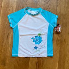 Super Cute Girls Color Block Swim Shirt Rashguard With Hawaiian Print Flowers. Size M (7/8)