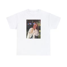 a white t - shirt with an image of a woman talking on a cell phone