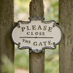 a sign that says please close to the gate