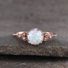 Solitaire Opal Engagement Ring Rose Gold | BBBGEM Opal And Diamond Engagement Rings Rose Gold, Vintage Opal Engagement Ring Victorian, Antique Opal Engagement Ring, Opalite Engagement Ring, Elegant Pink Opal Moonstone Ring, Elegant Opal Ring With Diamond Accents, Elegant Opal Ring With Center Stone, Elegant Three Stone Round Opal Ring, Elegant Three Stone Opal Ring