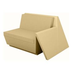 a beige couch with an open back