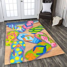 colorful flip flops on the beach area rug