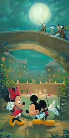 two mickey mouses are sitting at a dinner table in front of a full moon