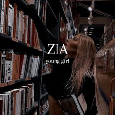 a woman standing in front of a bookshelf with the words college on it