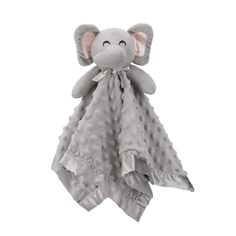 a gray elephant blanket with polka dots on it's face and ears, sitting in front of a white background