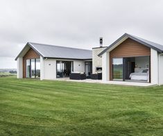 a house that is sitting in the grass