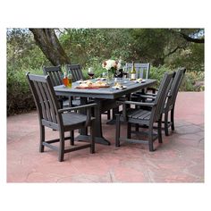 an outdoor dining table with six chairs