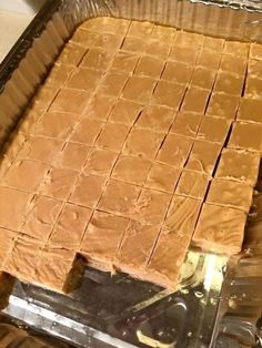 a pan filled with brownies sitting on top of a counter