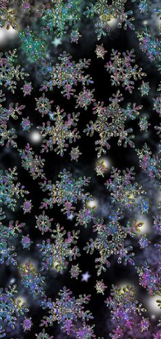 snowflakes are flying in the air on a black background with white and blue stars