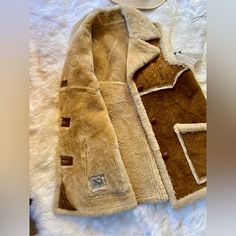 Amazing! 1970’s High Grade Western Wear Vest By H Bar C California Ranchwear. Heavyweight, Durable And Warm. Made Of Suede And Thick Sherpa Lining. Has Two Deep Functional Front Pockets, An Oversized Proper 1970's Collar. Western Sherpa Outlined Yoke. Large Leather Weaved Buttons Down The Front For Closure. One Plastic Button Off To The Left Under The Collar To Button All The Way Up Around The Neck. Size 10 Or L-Xl Measurements: Length: 32 In Chest/Bust: 21 In Waist: 22 In Bottom: 27 1/2 In Pock Shearling Vest, Western Wear, Warm And Cozy, Size 10, 1970s, Jackets & Coats, Jackets For Women, Im Not Perfect, 10 Things