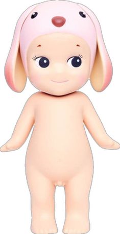 a pink stuffed animal with big eyes and ears on it's head, standing in front of a white background