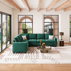 a living room filled with furniture and lots of windows