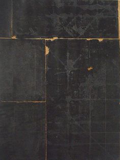 an abstract painting with black and yellow squares