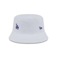 The Los Angeles Dodgers Court Sport Bucket Hat features an embroidered Dodgers logo at the front with a terry cloth fabrication. Dodger Hats, Dodgers Logo, White Bucket Hat, Boise State Broncos, All Nfl Teams, Trash Panda, Los Angeles Chargers, Bandana Print, Oakland Athletics