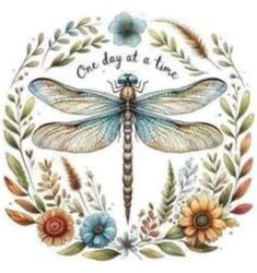 a dragonfly sitting on top of a flower wreath with the words one day at a time