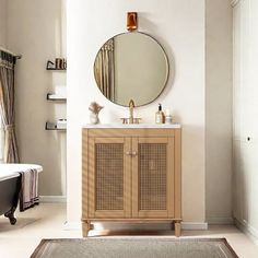 a bathroom with a sink, mirror and bathtub