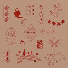 a bunch of different designs on a piece of brown paper with red ink in it