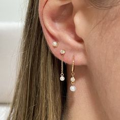 14k gold tiny prong set white freshwater cultured pearl stud earrings SPECIFICS • pearls are approx. 2mm• sold as pair or single Pearl Drop Earrings Wedding, Pearl Earring Set, Chain Drop Earrings, Freshwater Cultured Pearls, Ruby Jewelry, Pearl Stud Earrings, Pearl Chain, June Birth Stone, Pearl Studs