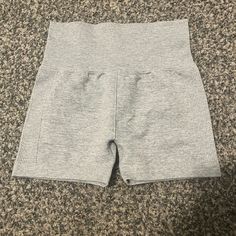 Never Worn Grey Spandex Shorts, Casual Gray Mid-thigh Length Shorts, Trendy Stretch High-waisted Shorts, Fitted Gray Athletic Shorts, Trendy Stretch Athletic Shorts Mid-thigh Length, Gray Fitted Athletic Shorts, Trendy Stretch Mid-thigh Athletic Shorts, Gray Fitted High Waist Shorts, Trendy Stretch Mid-thigh Length Athletic Shorts