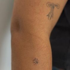 a person with a tattoo on their arm