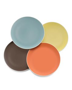 four plates with different colors on them