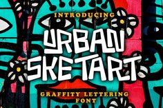 the urban graffiti font is displayed in front of a colorful wall with black and white designs